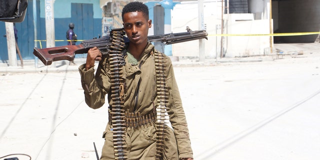 Soldiers patrol outside the Hayat Hotel in Mogadishu, Somalia on Saturday, August 20, 2022. 