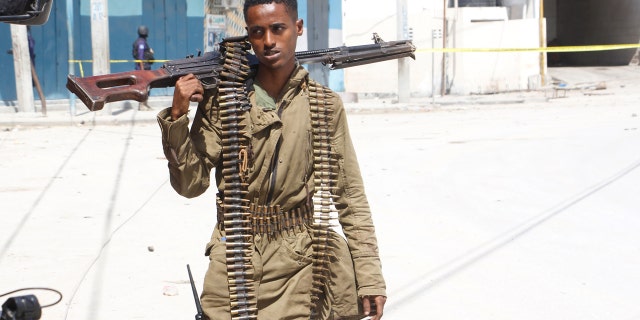 Soldiers patrol outside the Hayat Hotel in Mogadishu, Somalia on Saturday, August 20, 2022. 