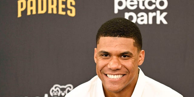 Juan Soto #22 of the San Diego Padres listens to a question during a news conference held to introduce him to the team August 3, 2022 at Petco Park in San Diego, California.