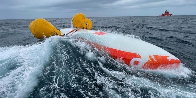 The French sailboat Jeanne SOLO Sailor overturned about 14 miles from the Sisargas Islands off Spain's northwestern Galicia region, officials said.