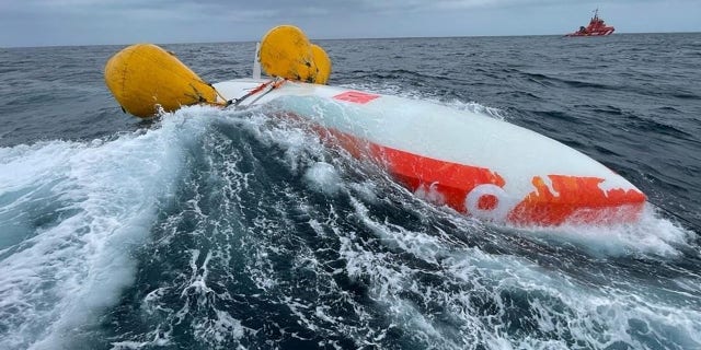 The French sailboat Jeanne SOLO Sailor overturned about 14 miles from the Sisargas Islands off Spain's northwestern Galicia region, officials said.