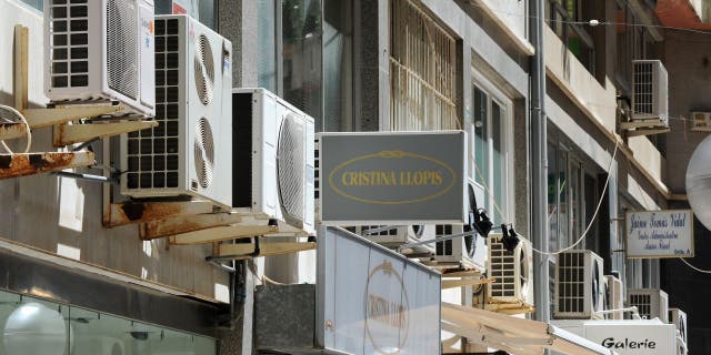 Air conditioners can be seen on a commercial building in Palma de Mallorca on May 24, 2010, in Palma de Mallorca, Spain.