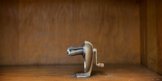 A pencil sharpener sits in an empty cabinet in the classroom of Denisse Broussard at Benjamin Banneker Elementary School on May 23, 2014, in New Orleans. 