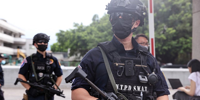 Taiwanese police officers on heightened alert after Taiwan is hit with multiple cyber attacks. Picture taken at the Jing-Mei Human Rights Memorial and Cultural Park in Taipei, Taiwan, on Wednesday, on Aug. 3, 2022. 