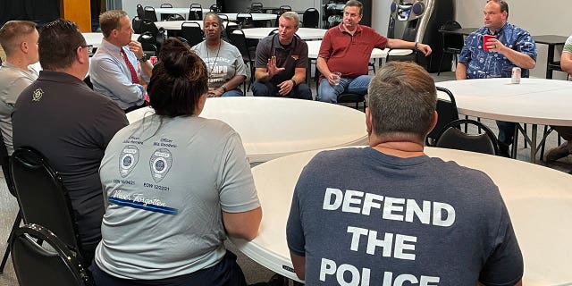 Rep. Ted Budd, a Republican running for U.S. Senate in North Carolina, listens during a Mecklenburg County FOP Lodge roundtable discussion in Charlotte on Saturday, Aug. 14, 2022.