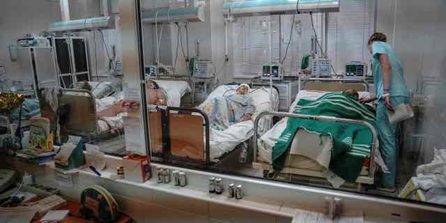 Ukrainians injured in a missile strike on a shopping mall being treated in a hospital, as Russia's attack on Ukraine continues, in Kremenchuk, in Poltava region, Ukraine on June 27, 2022.