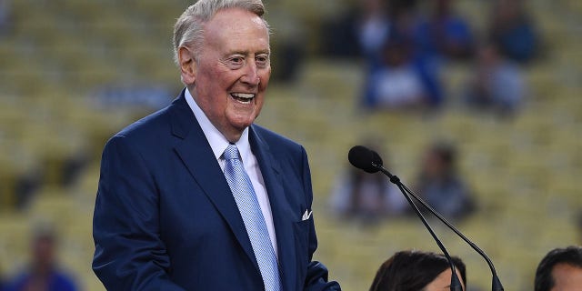 Retired Dodgers broadcaster Vin Scully speaks during a pregame ceremony honoring language broadcaster Jaime Jarrin inducting him into the Dodger Stadium Ring of Honor at Dodger Stadium on September 2, 2018 in Los Angeles, California.