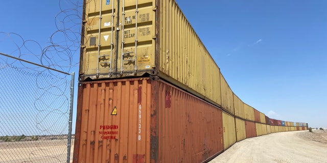 Construction to place these shipping containers in gaps in the border wall began on Aug. 12, 2022, in Yuma, Arizona.