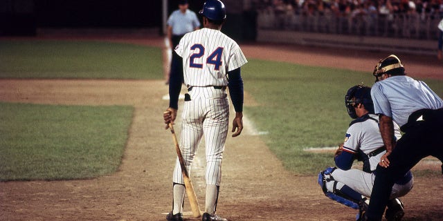 American baseball player Willie Mays (#24), of the New York Mets, steps up to home plate during a game (against the Chicago Cubs) at Shea Stadium, in the Corona neighborhood of Queens, New York, New York, August 5, 1972.