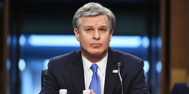 FBI Director Christopher Wray testifies before the Senate Judiciary Committee in the Hart Senate Office Building on Capitol Hill in Washington, DC on March 2, 2021.