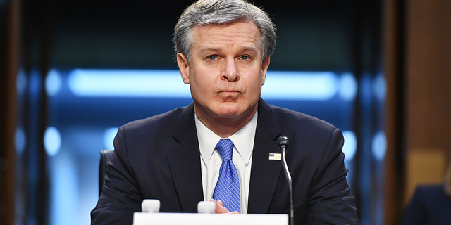 FBI Director Christopher Wray arrives to testify before the Senate Judiciary Committee on Capitol Hill, March 2, 2021.