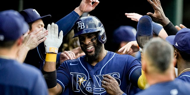 Tampa Bay Rays' Yandy Diaz celebrates after scoring a run against the Detroit Tigers at Comerica Park on August 4, 2022 in Detroit.