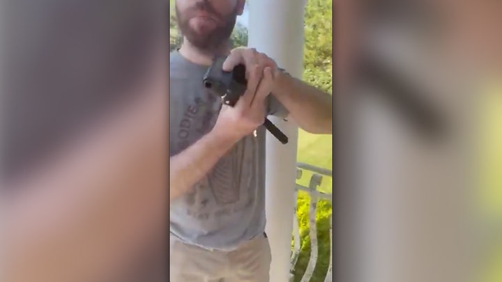 Man films neighbor drawing handgun on his front porch