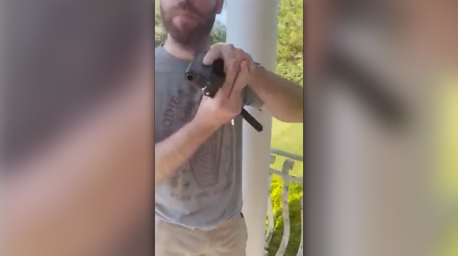 Man films neighbor drawing handgun on his front porch