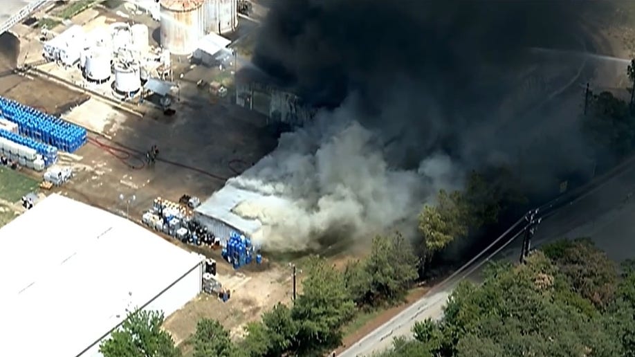 Firefighters battle a large blaze after a chemical plant caught fire in Texas
