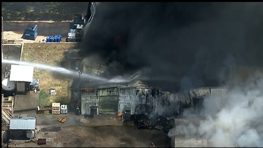 Firefighters battling a large blaze on Wednesday in Texas