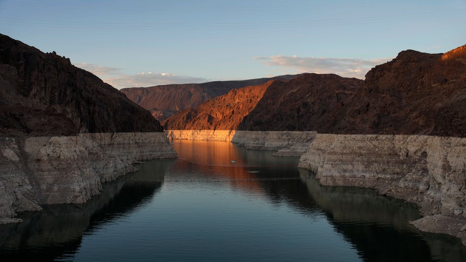 A bathtub ring of light minerals shows the high water line of Lake Mead