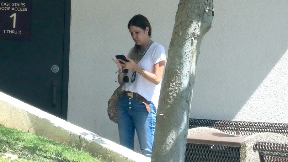 Heather Duffy staring at phone