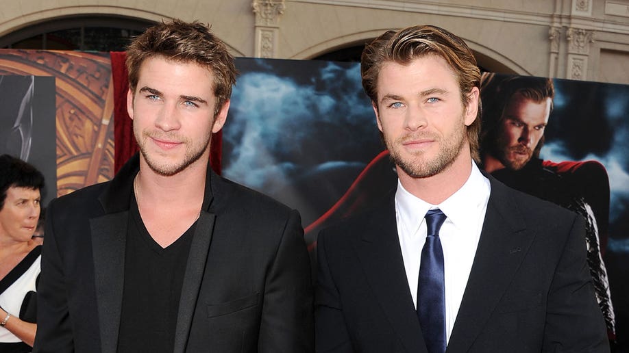 Liam Hemsworth with his actor brother Chris Hemsworth