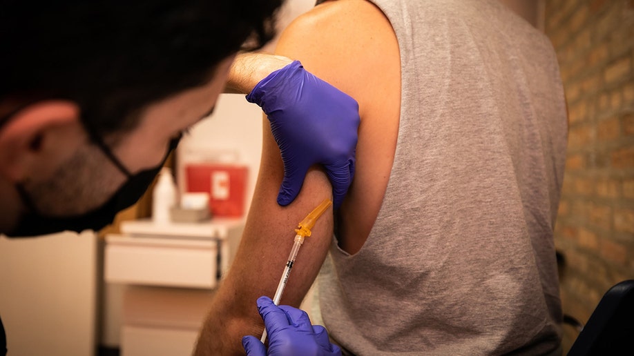 A patient receiving a monkeypox vaccine