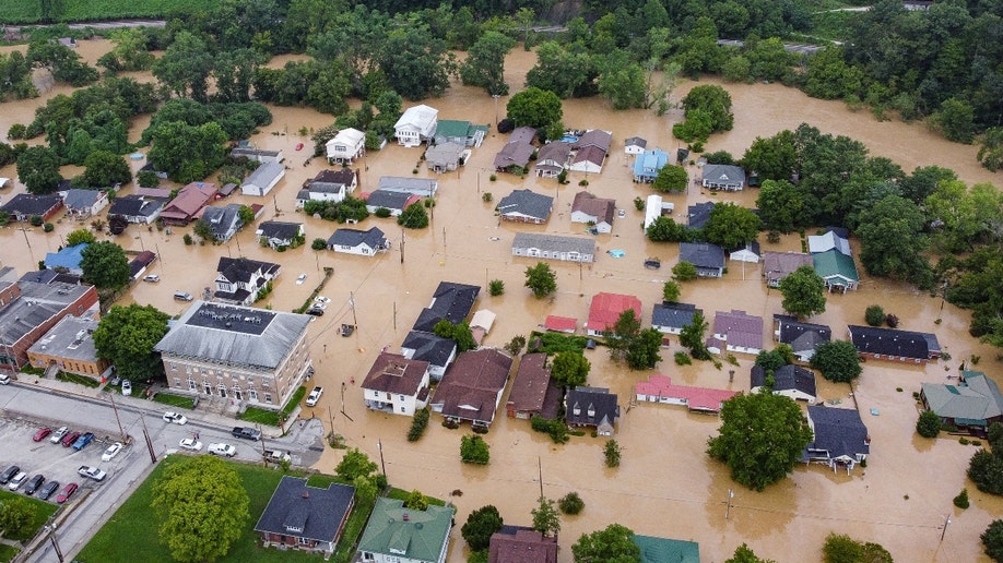 Aerial view of homes surrounded by flood waters in Jackson, Kentucky.