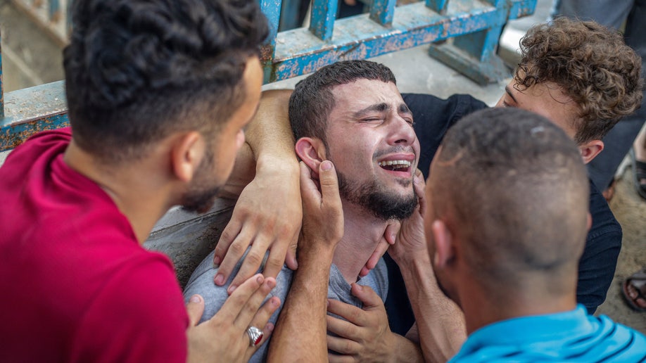 Palestinian man cries
