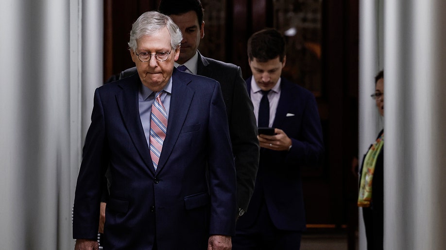 Mitch McConnell walking