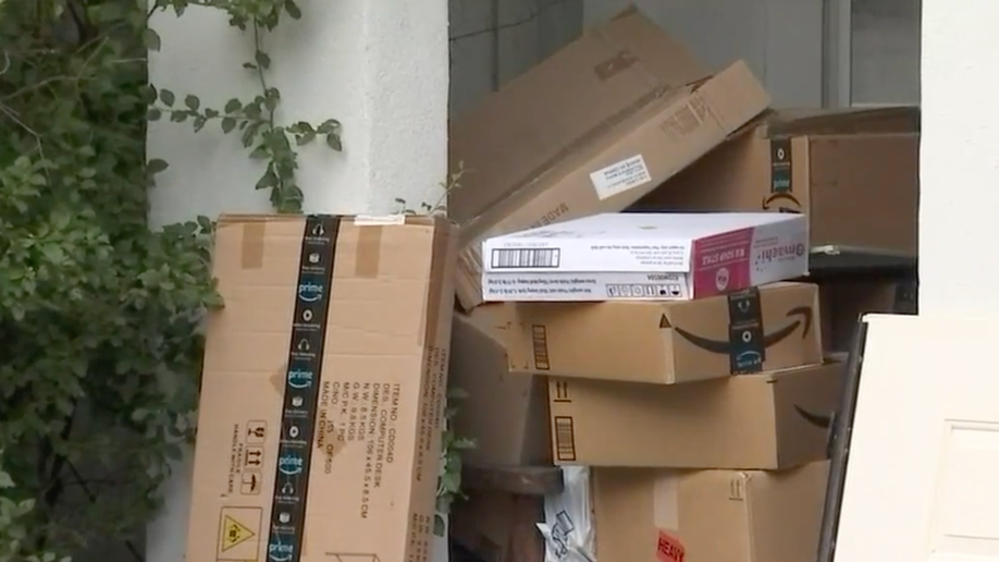 Boxes stacked on front porch