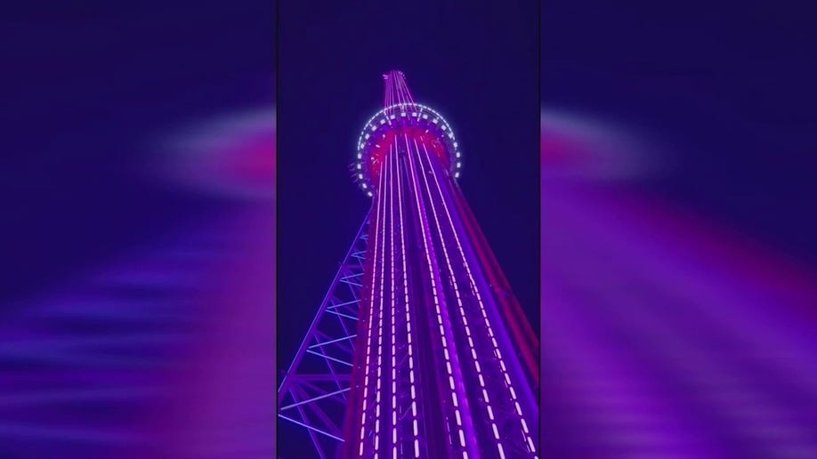 A photo of the FreeFall ride at night