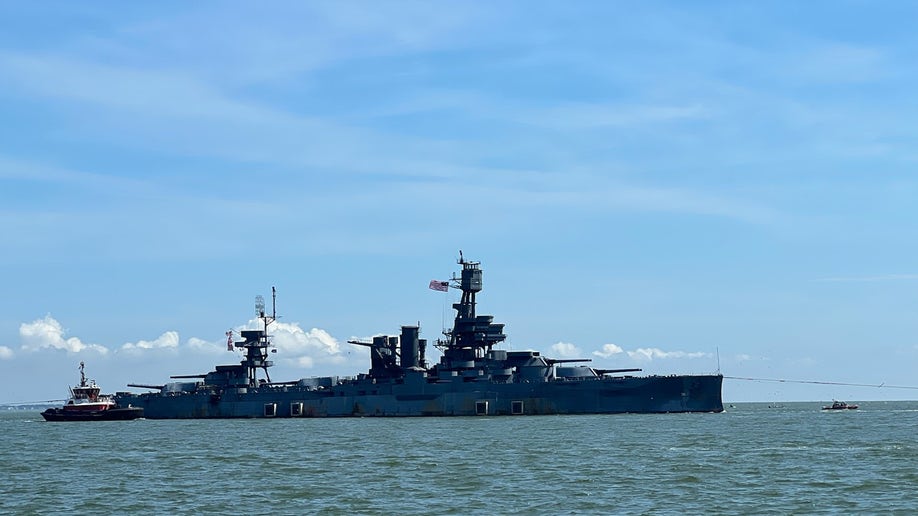 Battleship Texas being towed