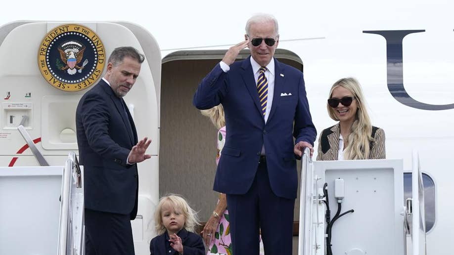 President Biden returns salute