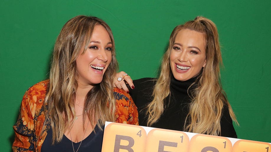 Sisters Hilary Duff and Haylie Duff smiling in 2017