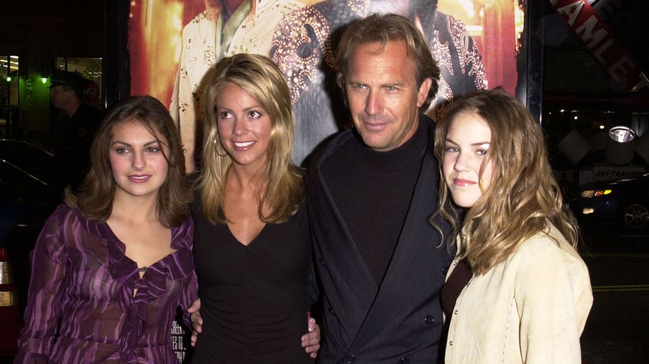 Kevin Costner with Christine Baumgartner and daughters