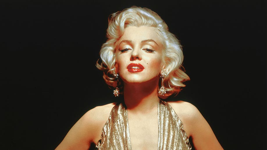 Marilyn Monroe in a gold dress in 1953. 