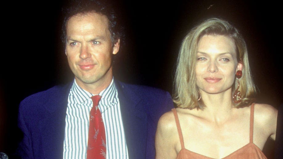 Catwoman actress Michelle Michelle Pfeiffer and Batman actor Michael Keaton at the 