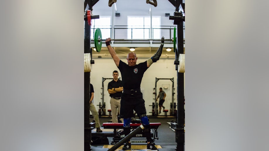 Ivan Morera lifting weights