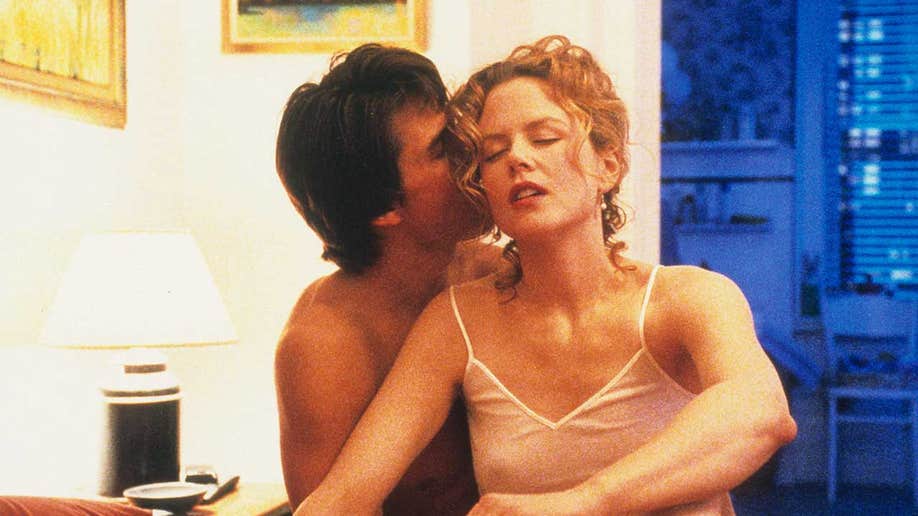 Tom Cruise kissing Nicole Kidman in 