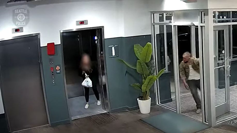 woman in apartment elevator