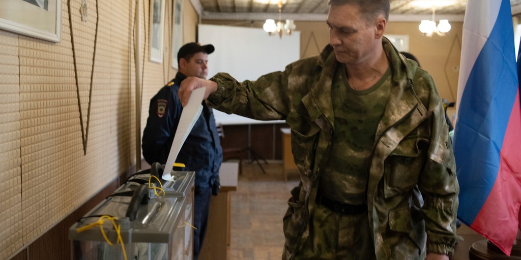 Russian proxies intimidate Ukrainians and force referendum
vote on annexation: local official