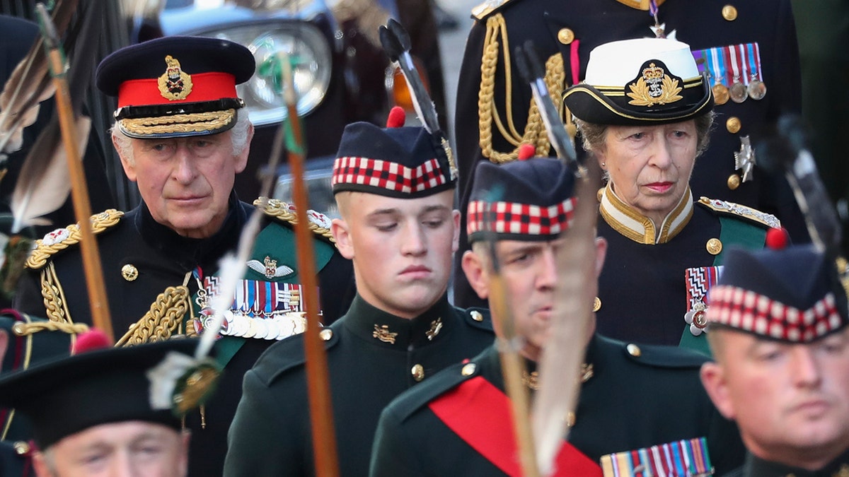 King Charles III and Princess Anne follow the coffin of Queen Elizabeth II