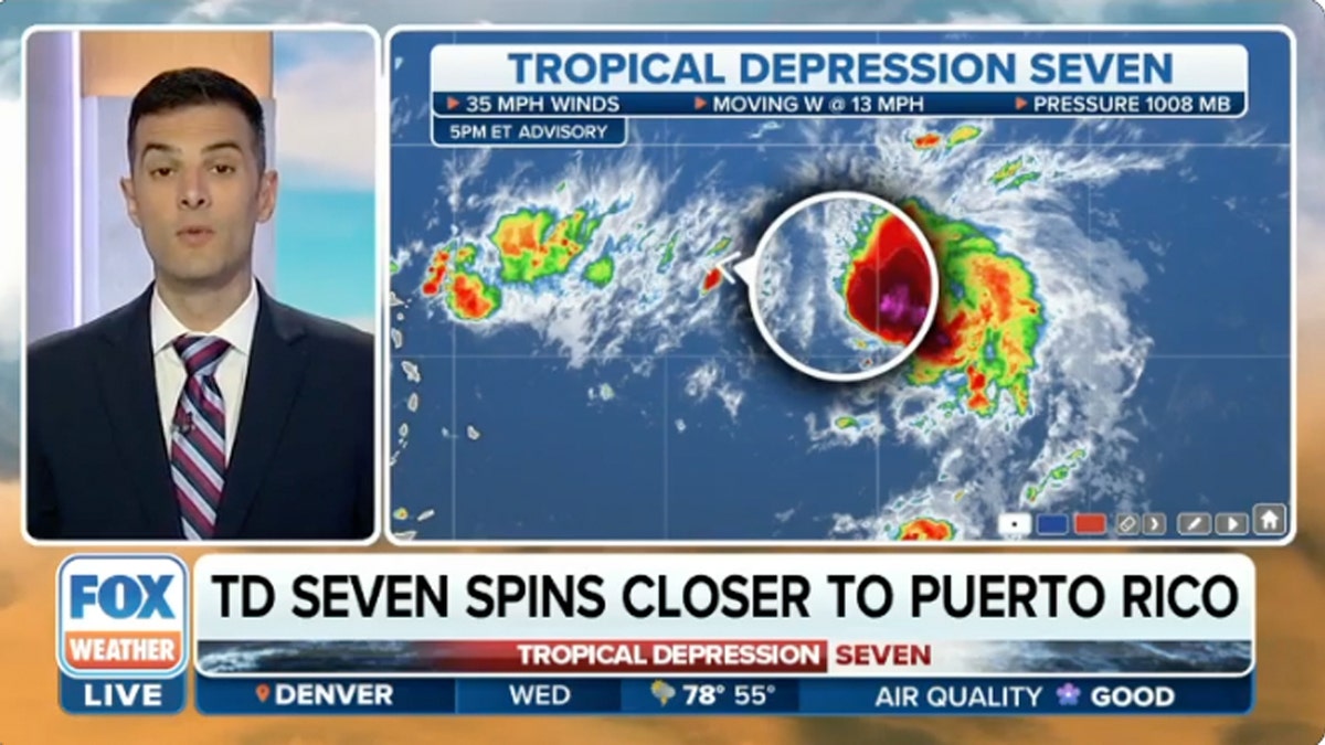 A weather reporter next to a map showing a tropical depression