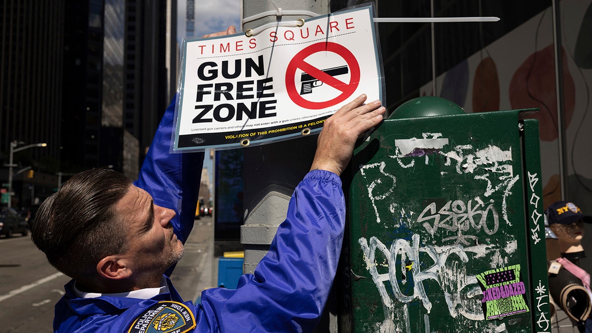 gun free zone sign times square