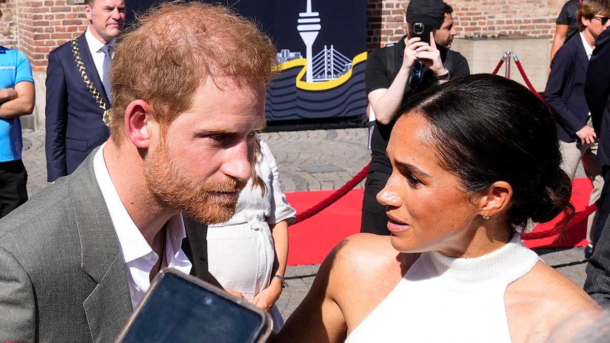 Prince Harry and Meghan Markle at the Invictus Games before the Queen's death
