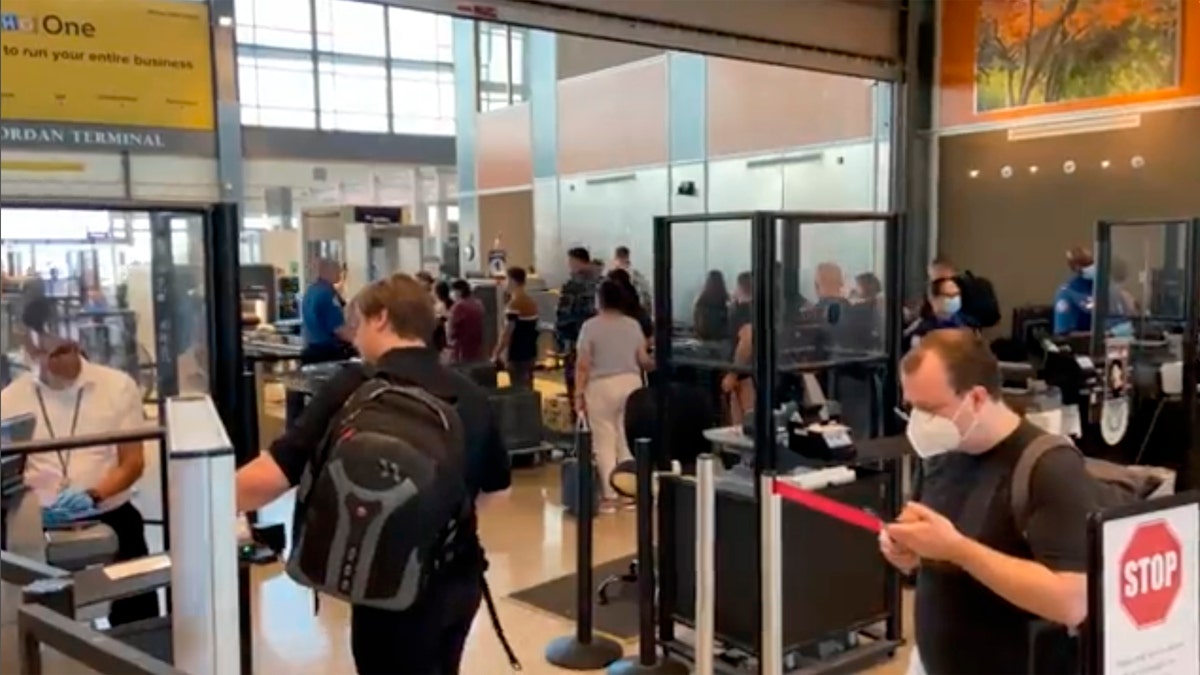 Travelers line up at a TSA screening area at Austin-Bergstrom International Airport