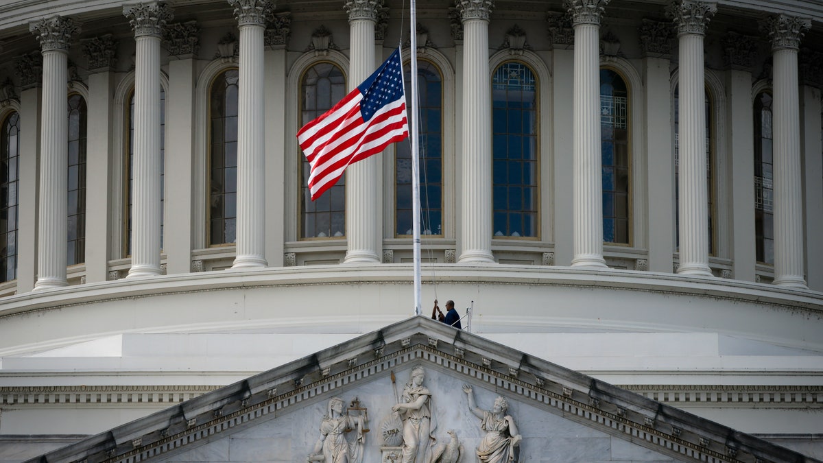 The U.S. flag is lowered to half-staff at the U.S. Capitol