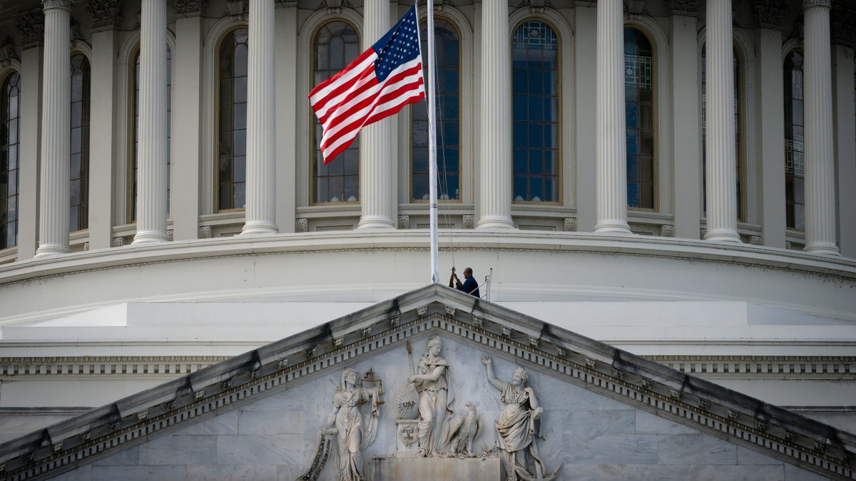 The U.S. flag is lowered to half-staff at the U.S. Capitol