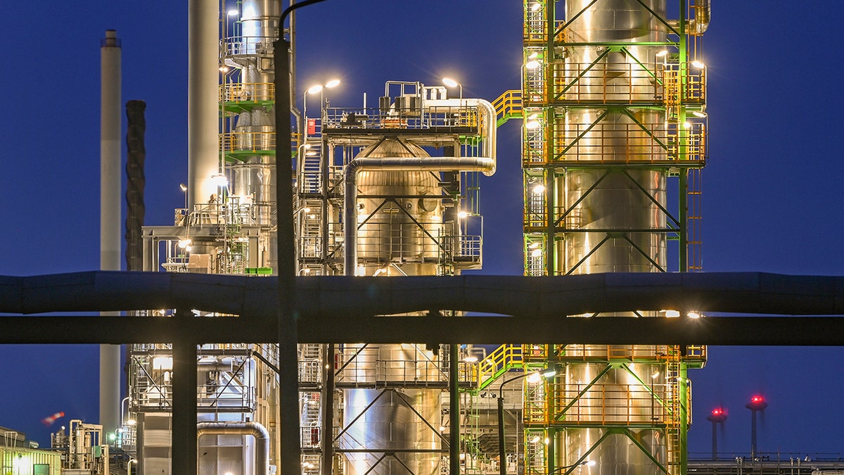 An oil refinery lit up at night