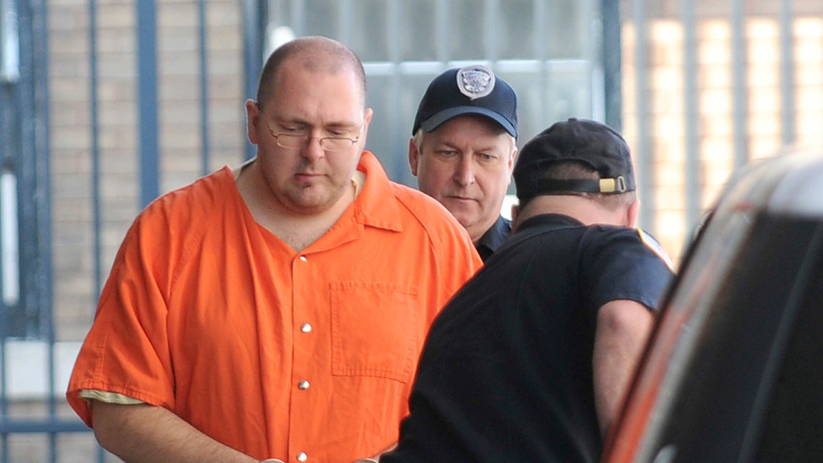 Kentucky school shooter in prison jumpsuit