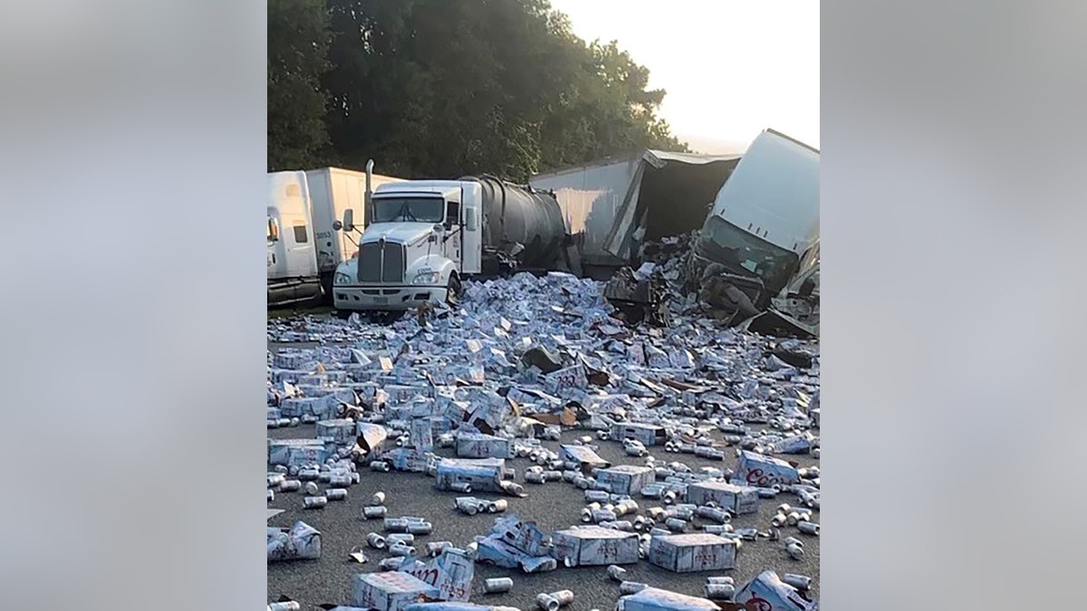 Two semis crashed sending cans of beer flying onto a Florida highway