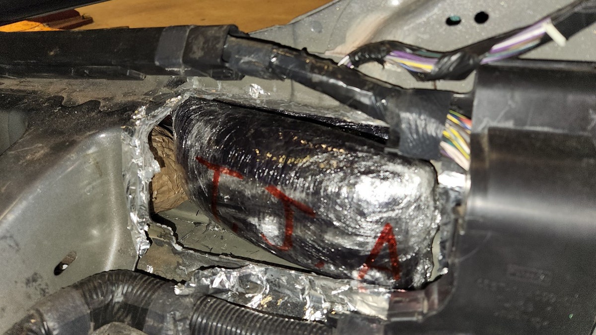 suspected fentanyl package hidden inside car